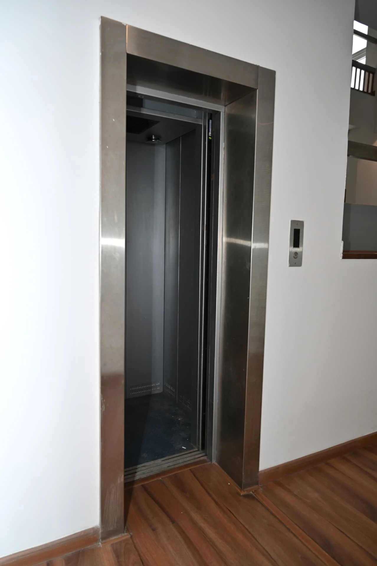 Steel-framed lift serving basement through second floor, Prestige Laughing Waters luxury villa for rent, Whitefield, Bangalore