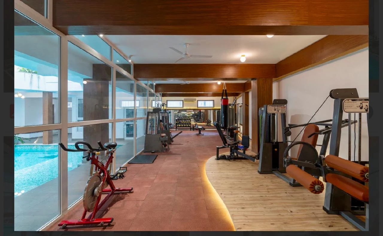 Glass-walled gym looking onto the indoor pool, Laughing Waters twin villas for sale, Whitefield, Bengaluru