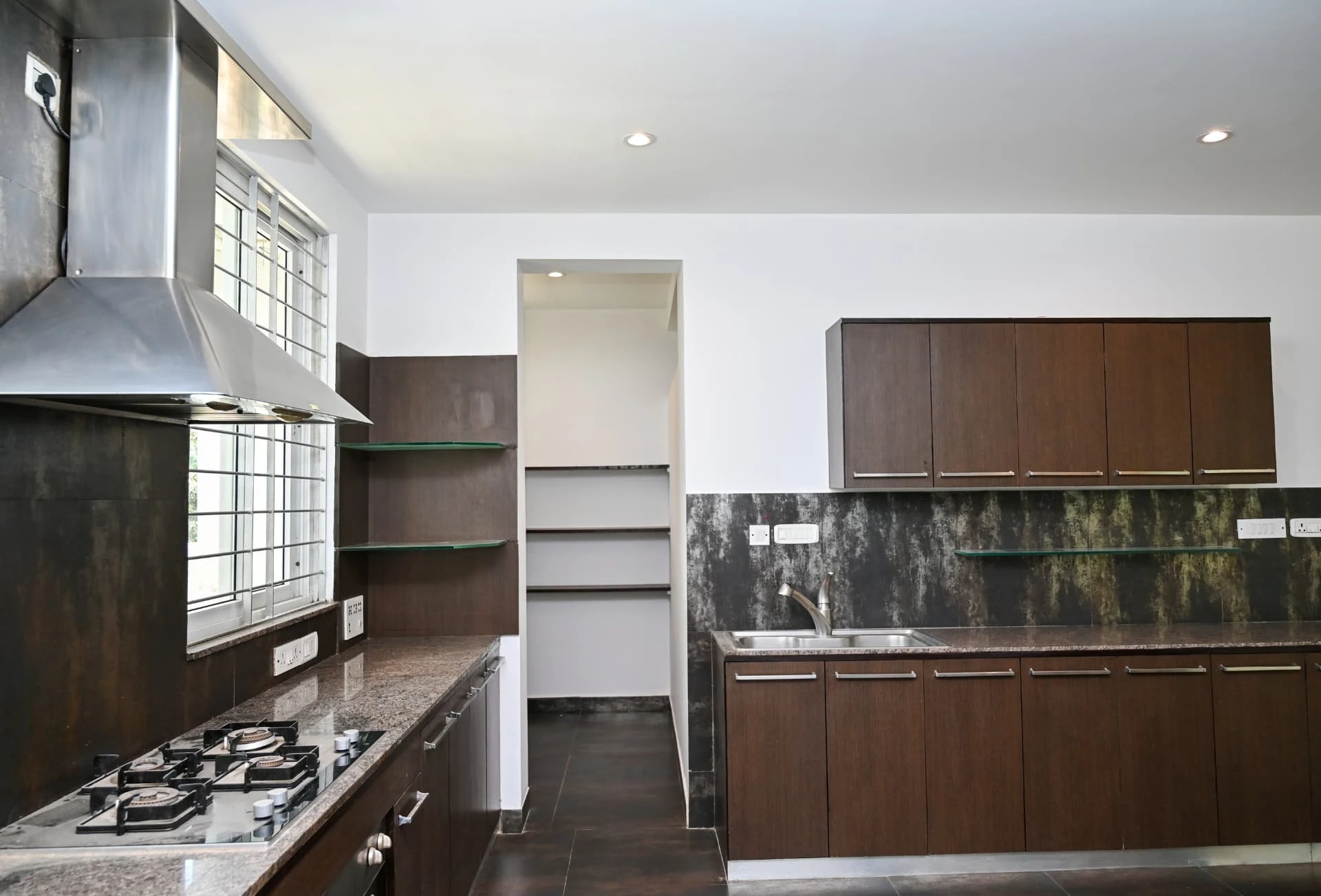 Kitchen with granite counters, larder and segregated utility, Prestige Laughing Waters luxury villa for rent, Whitefield, Bangalore