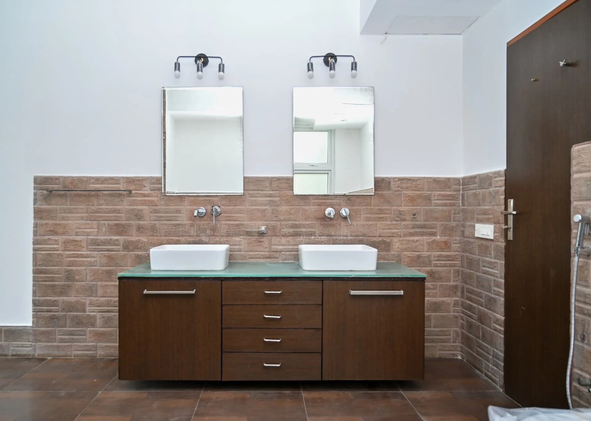 Second villa double vanity against brick-clad walls, Laughing Waters twin villas for sale, Whitefield, Bengaluru
